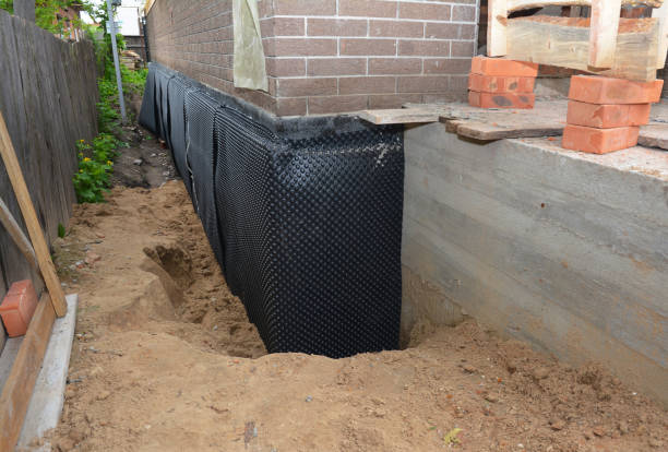 Happy homeowners after waterproofing job in Bay Village
